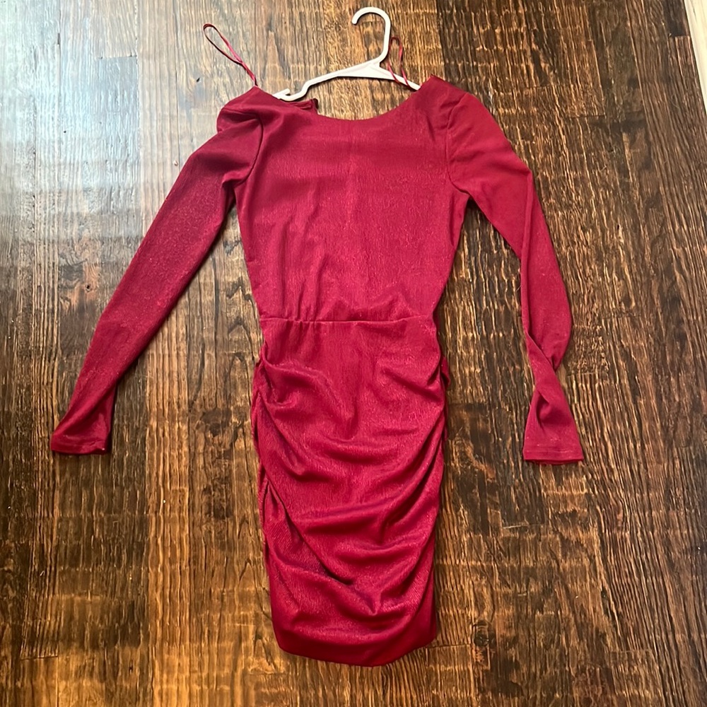 Francesca’s XXS dress new without tags wore once! No holes or tears! Long sleeve